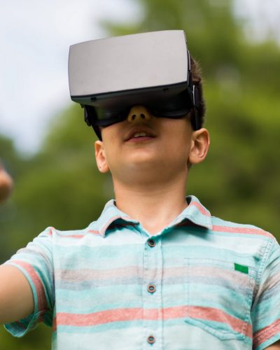 boy-with-virtual-reality-headset-outdoors-2022-10-07-03-20-57-utc-min